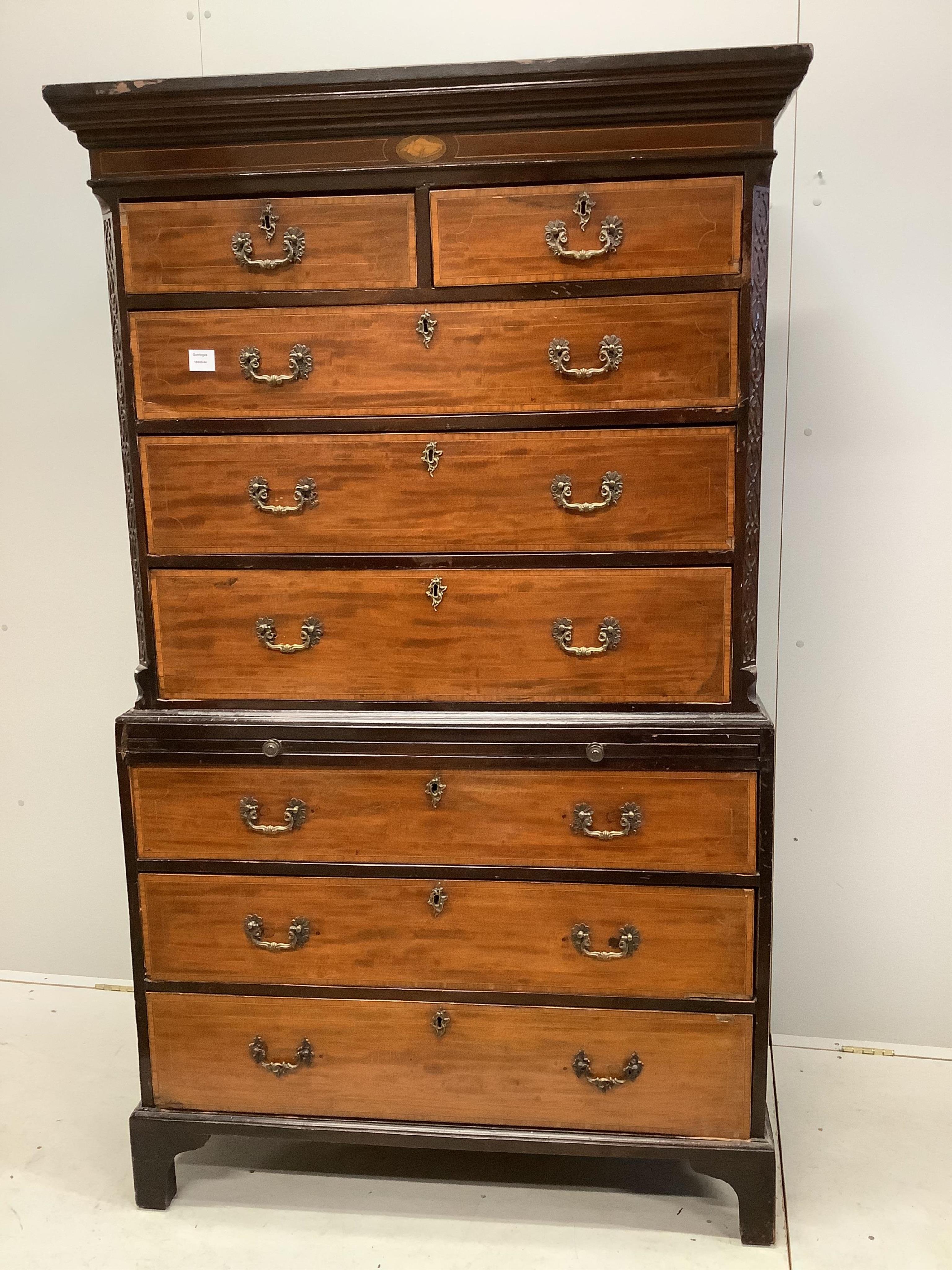 A George III satinwood banded mahogany chest on chest, width 110cm, depth 56cm, height 186cm. Condition - poor to fair